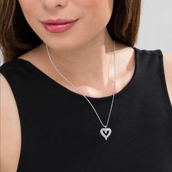 3/4 CT. T.w. Baguette and Round Diamond Swirl Heart Pendant in Sterling Silver