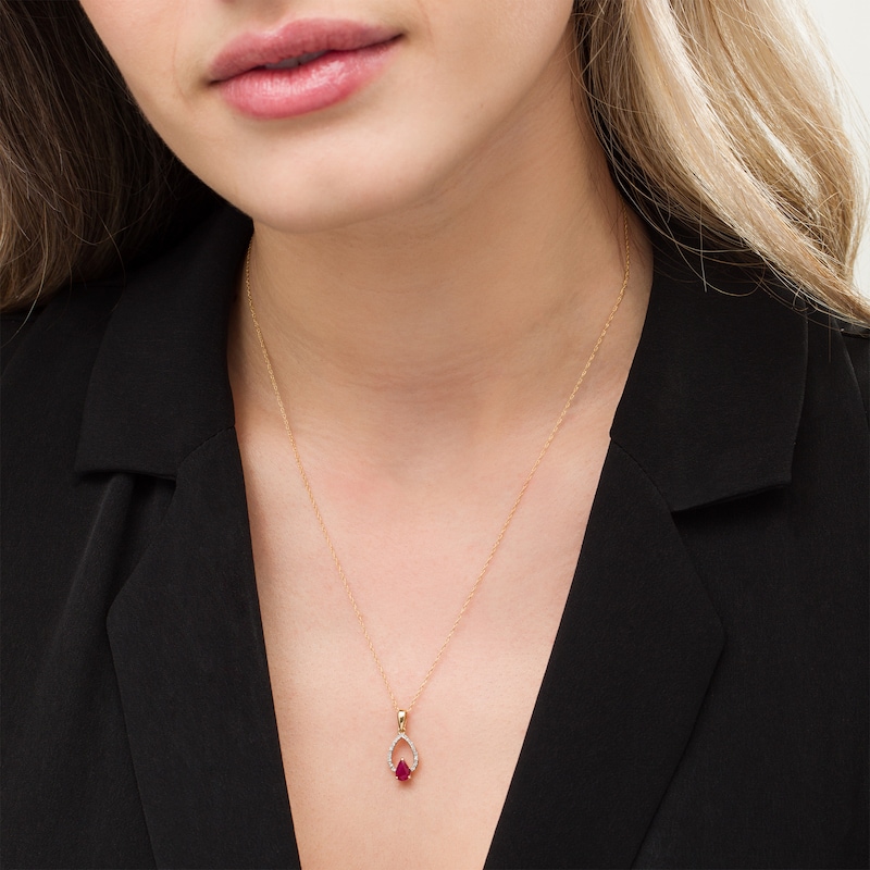Main Image 2 of Pear-Shaped Ruby and 1/20 CT. T.W. Diamond Double Teardrop Pendant in 10K Gold