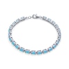 Thumbnail Image 1 of Oval Lab-Created Blue Opal Tennis Bracelet in Sterling Silver - 7.5"