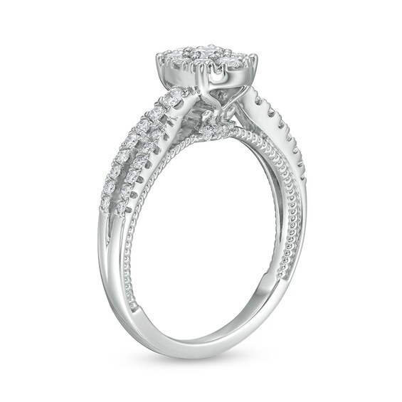 5/8 CT. T.w. Oval Multi-Diamond Crossover Shank Engagement Ring in 14K White Gold