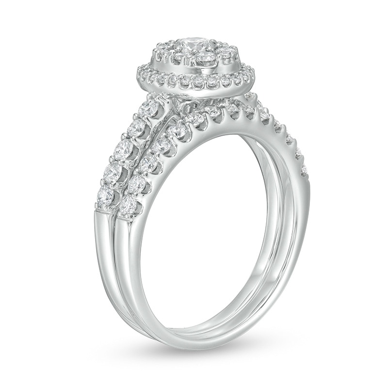 1 CT. T.W. Oval Multi-Diamond Frame Bridal Set in 14K White Gold