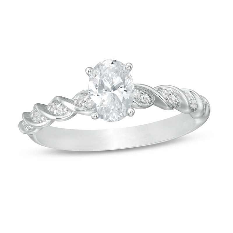 3/4 CT. T.W. Certified Oval Diamond Cascading Shank Engagement Ring in 14K White Gold (I/I1)