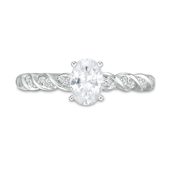 3/4 CT. T.w. Certified Oval Diamond Cascading Shank Engagement Ring in 14K White Gold (I/I1)