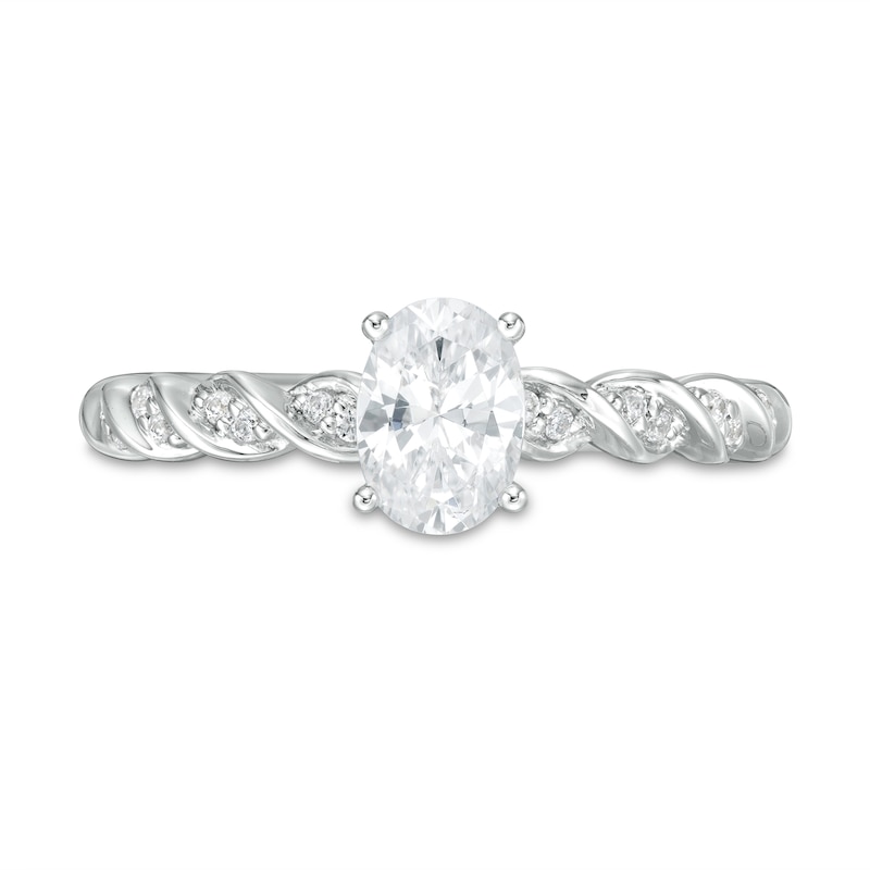 3/4 CT. T.W. Certified Oval Diamond Cascading Shank Engagement Ring in 14K White Gold (I/I1)