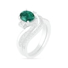 Thumbnail Image 1 of Oval Lab-Created Emerald and White Sapphire Side Accent Double Bypass Split Shank Bridal Set in Sterling Silver