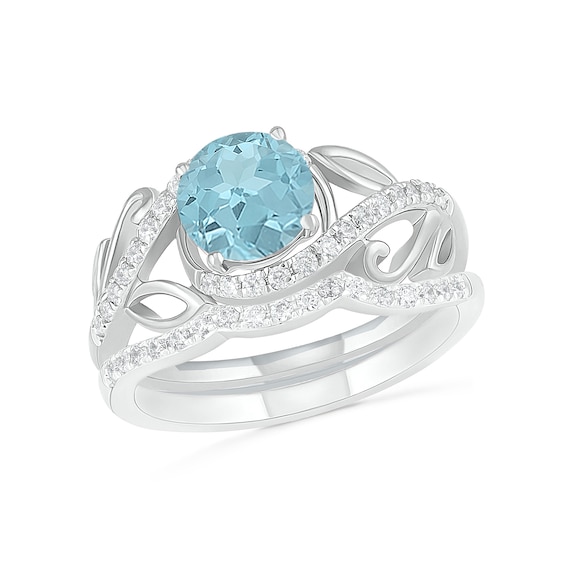 7.0mm Aquamarine and 3/8 CT. T.w. Diamond Bypass Leaf Shank Bridal Set in 10K White Gold