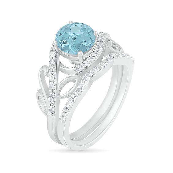7.0mm Aquamarine and 3/8 CT. T.w. Diamond Bypass Leaf Shank Bridal Set in 10K White Gold