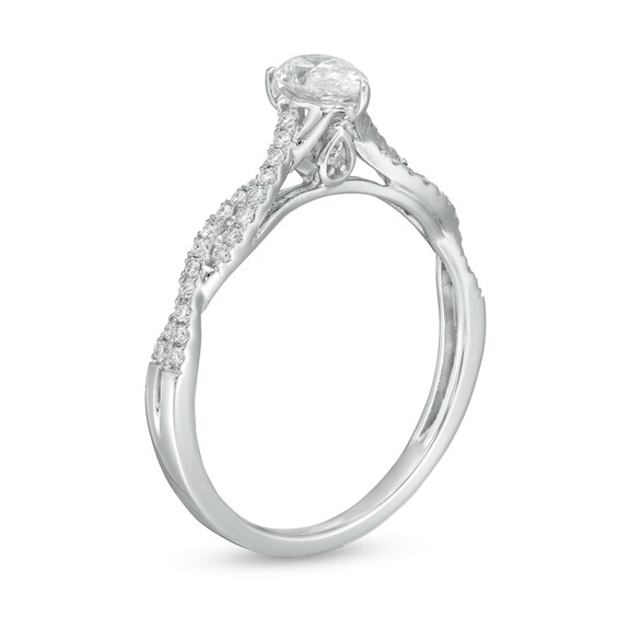 1/2 CT. T.w. Pear-Shaped Diamond Twist Shank Engagement Ring in 14K White Gold (I/I1)