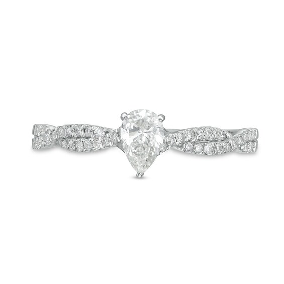 1/2 CT. T.w. Pear-Shaped Diamond Twist Shank Engagement Ring in 14K White Gold (I/I1)