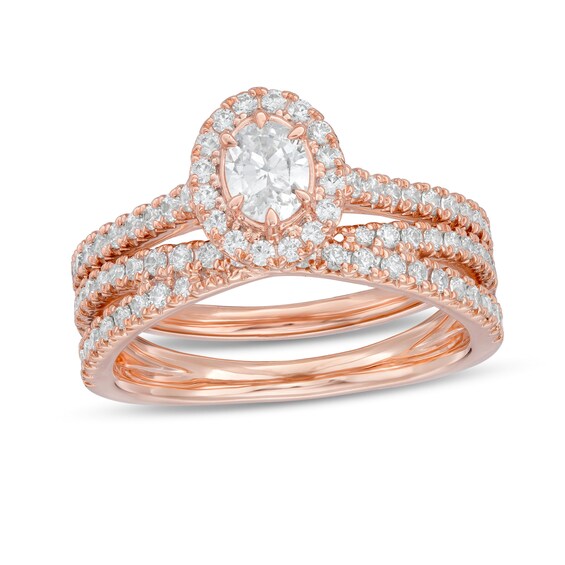 1 CT. T.W. Oval Diamond Frame Crossover Bridal Set in 14K Rose Gold 1 CT. T.W. Oval Diamond Frame Crossover Bridal Set in 14K Rose Gold