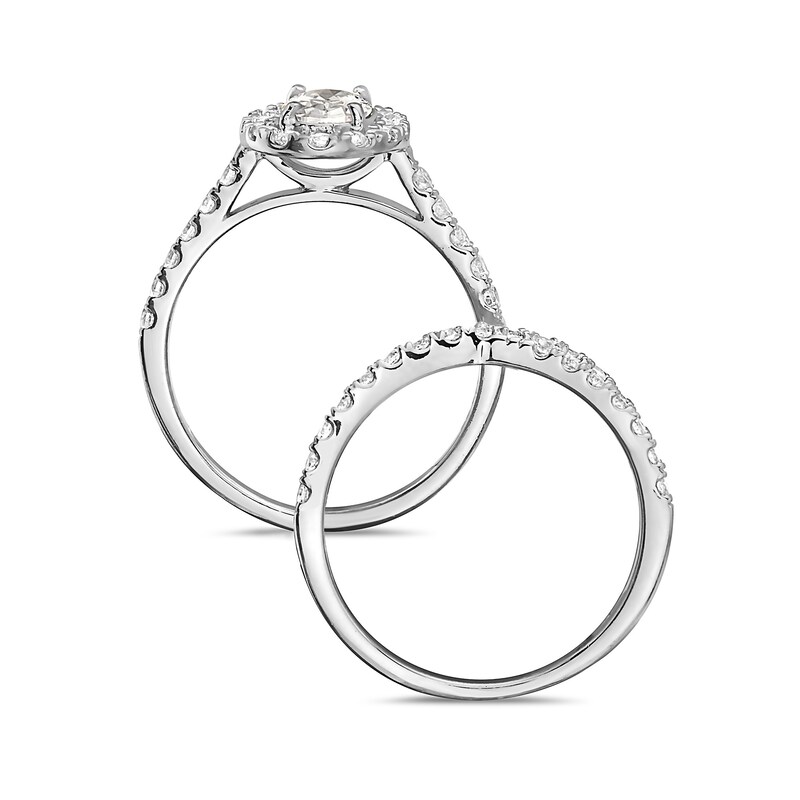 2-1/4 CT. T.W. Oval Diamond Frame Criss-Cross Bridal Set in 14K White Gold