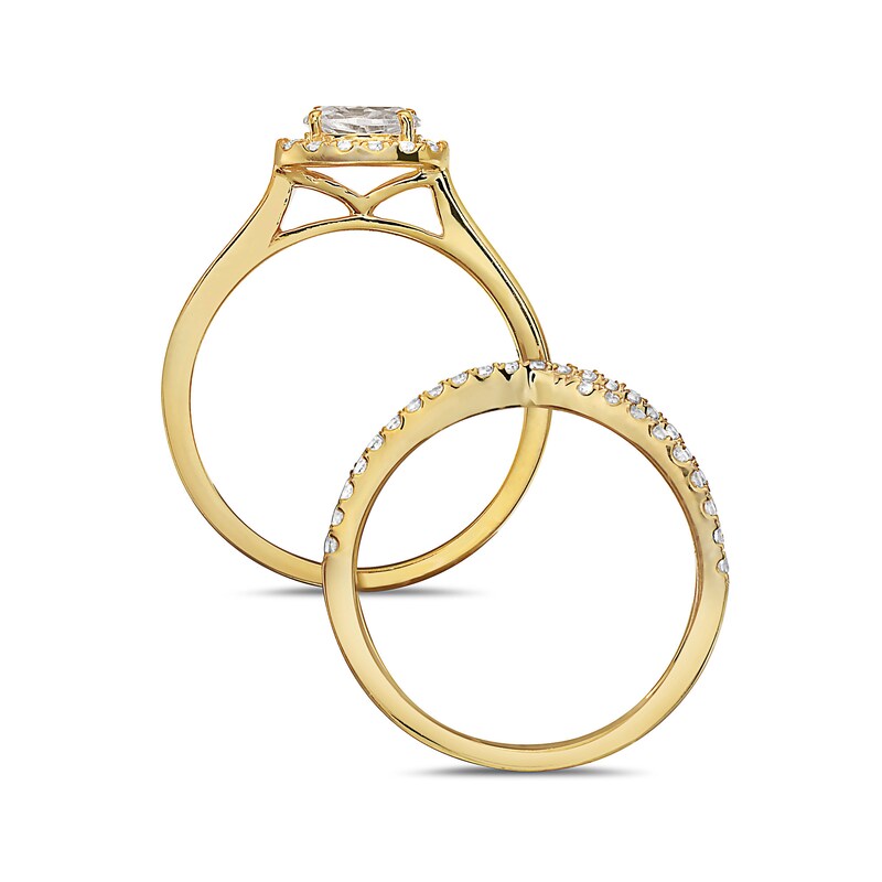 1 CT. T.W. Oval Diamond Sideways Frame Criss-Cross Bridal Set in 14K Gold