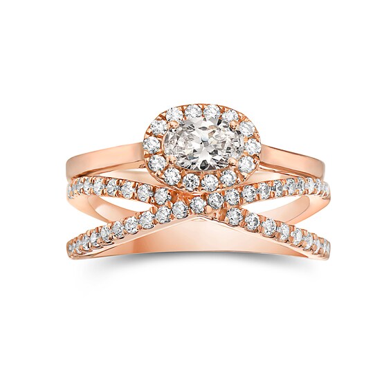 1 CT. T.W. Oval Diamond Sideways Frame Criss-Cross Bridal Set in 14K Rose Gold 1 CT. T.W. Oval Diamond Sideways Frame Criss-Cross Bridal Set in 14K Rose Gold