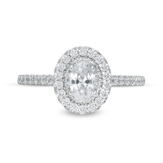 7/8 CT. T.w. Oval Diamond Double Frame Engagement Ring in 10K White Gold