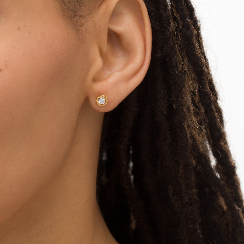 Main Image 2 of 1/6 CT. T.W. Diamond Solitaire Rope Frame Stud Earrings in 10K Gold (I/I3)