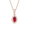 Thumbnail Image 1 of Oval Ruby and 1/20 CT. T.W. Diamond Framed Vintage-Style Drop Pendant in 10K Rose Gold