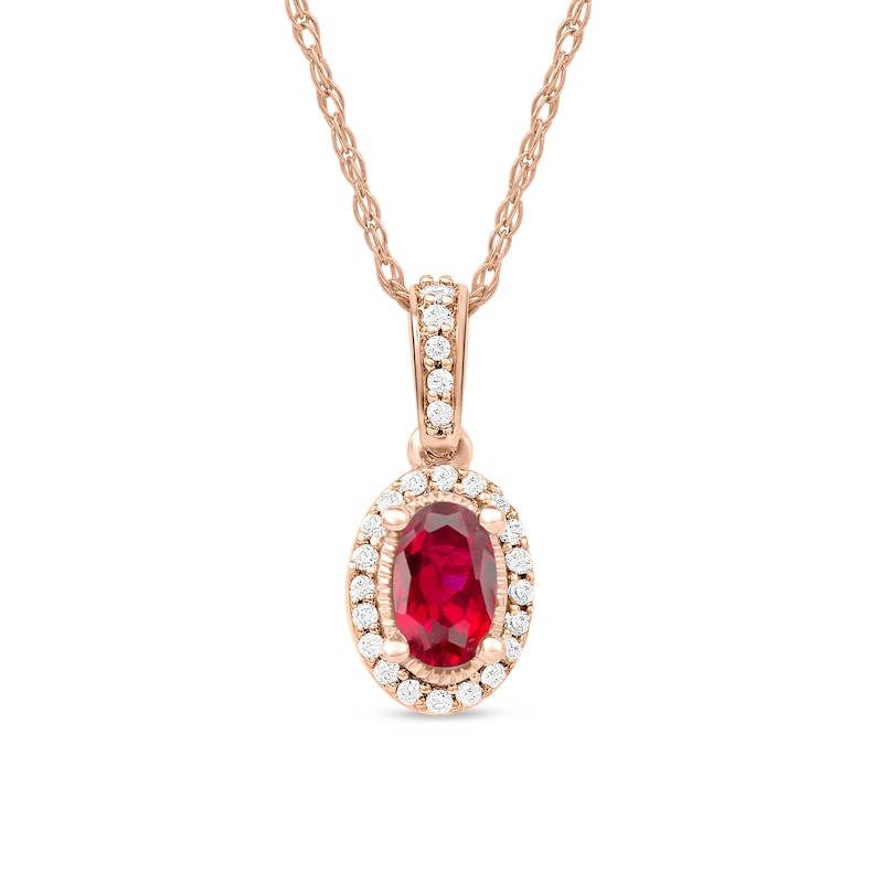 Main Image 1 of Oval Ruby and 1/20 CT. T.W. Diamond Framed Vintage-Style Drop Pendant in 10K Rose Gold