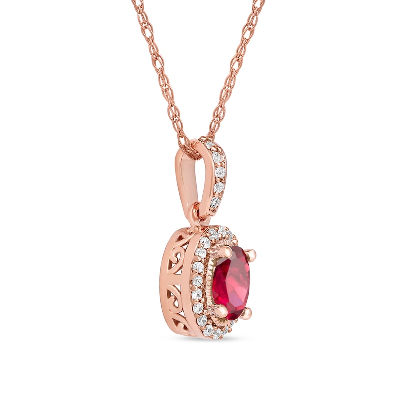 Oval Ruby and 1/20 CT. T.W. Diamond Framed Vintage-Style Drop Pendant in 10K Rose Gold