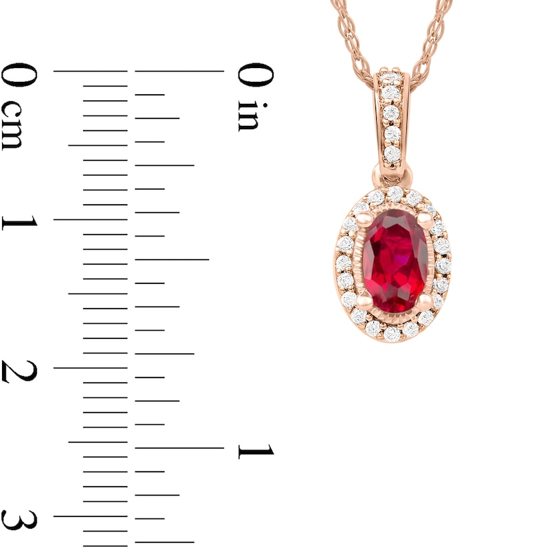 Oval Ruby and 1/20 CT. T.W. Diamond Framed Vintage-Style Drop Pendant in 10K Rose Gold