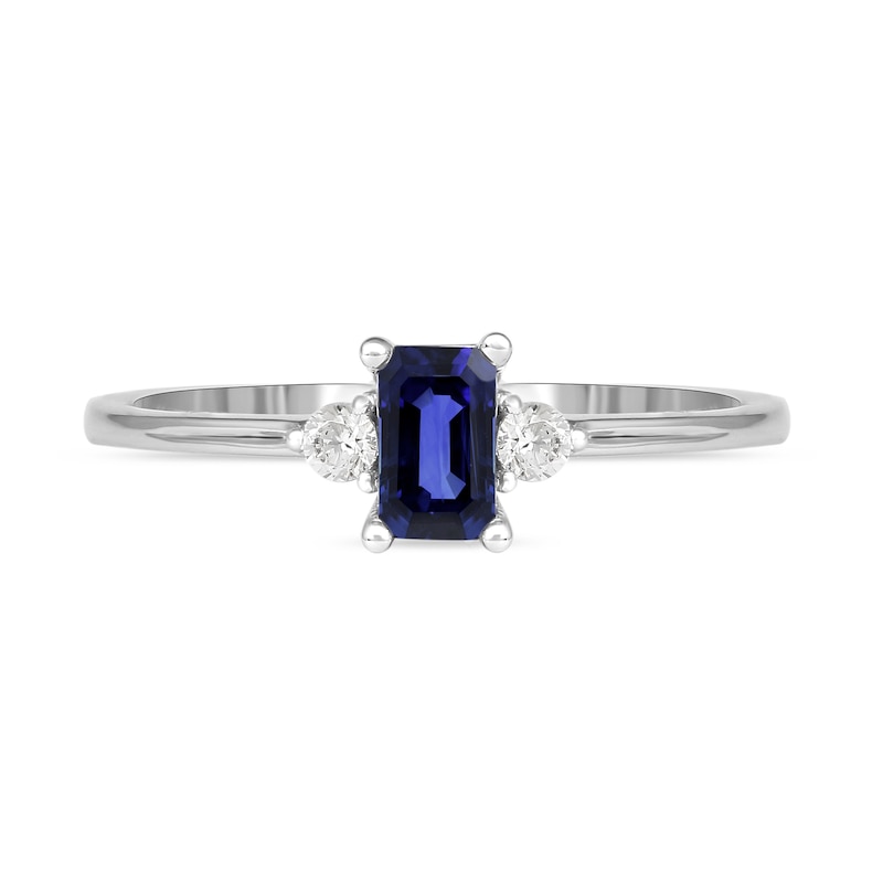 Main Image 3 of Emerald-Cut Blue Sapphire and 1/15 CT. T.W. Diamond Three Stone Grooved Ring in 10K White Gold