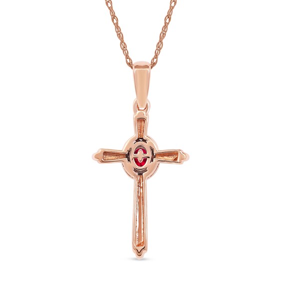 Oval Ruby and 1/20 CT. T.w. Diamond Frame Layered Cross Pendant in 10K Rose Gold