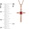 Thumbnail Image 5 of Oval Ruby and 1/20 CT. T.W. Diamond Frame Layered Cross Pendant in 10K Rose Gold