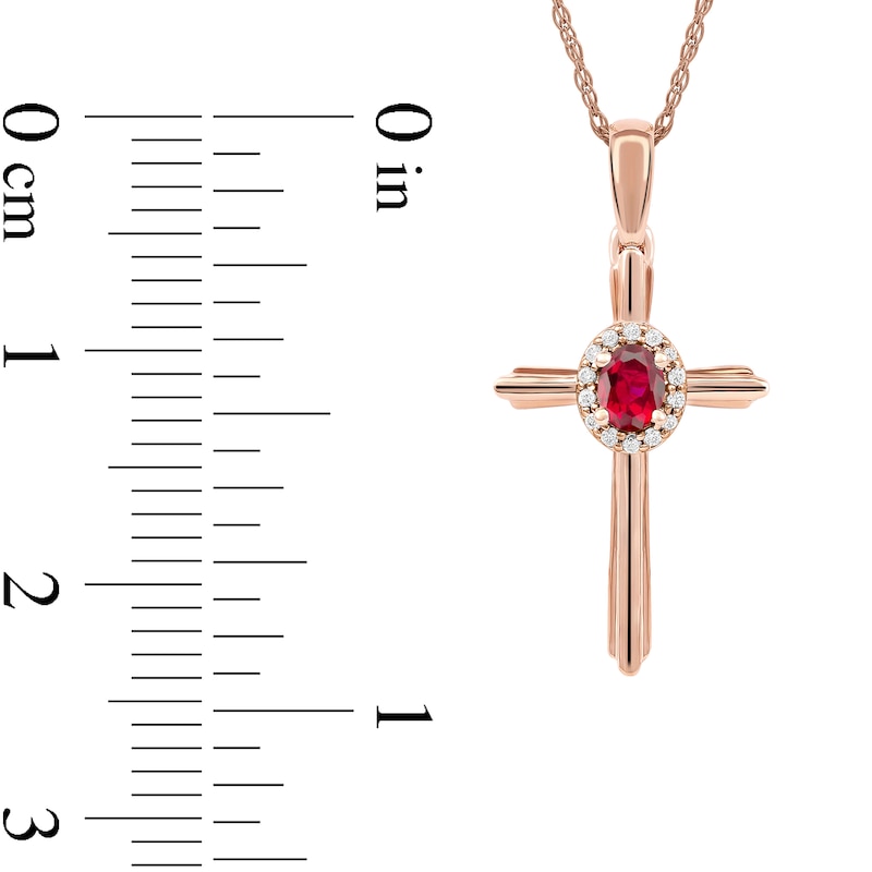 Main Image 5 of Oval Ruby and 1/20 CT. T.W. Diamond Frame Layered Cross Pendant in 10K Rose Gold