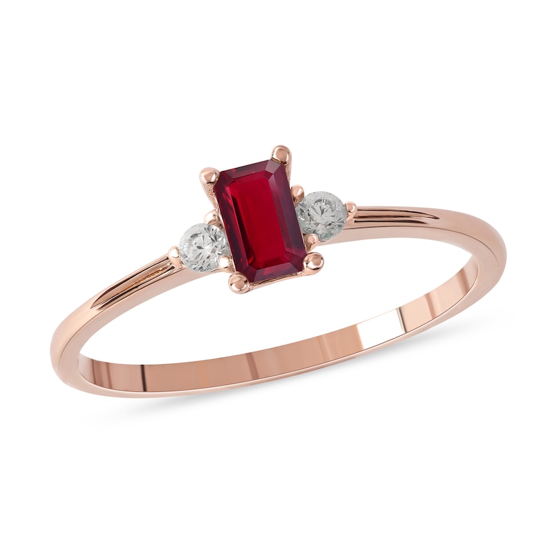Main Image 1 of Emerald-Cut Ruby and 1/15 CT. T.W. Diamond Three Stone Grooved Ring in 10K Rose Gold