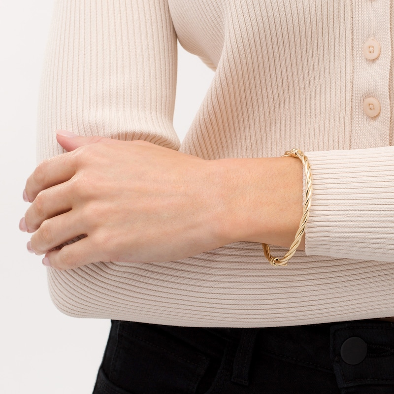 Main Image 2 of Italian Gold 60.0 x 50.0 x 4.0mm Twist Bangle in Hollow 14K Gold