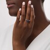Thumbnail Image 2 of Wonder Woman™ Collection Garnet, Blue Sapphire and 1/15 CT. T.W. Diamond Symbol Ring in Sterling Silver