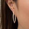 Thumbnail Image 1 of 2 CT. T.W. Diamond Inside-Out Hoop Earrings in 10K Gold