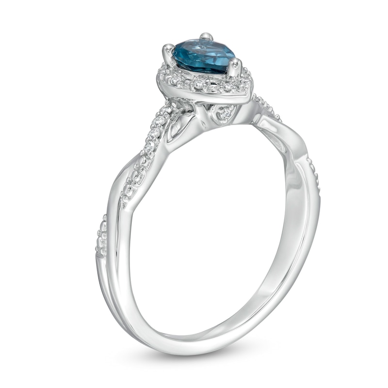 Main Image 3 of Cherished Promise Collection™ Enhanced Pear-Shaped Topaz and 1/15 CT. T.W. Diamond Frame Promise Ring in 10K White Gold