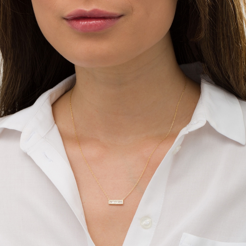Main Image 2 of 1/6 CT. T.W. Baguette and Round Diamond Bar Necklace in 10K Gold