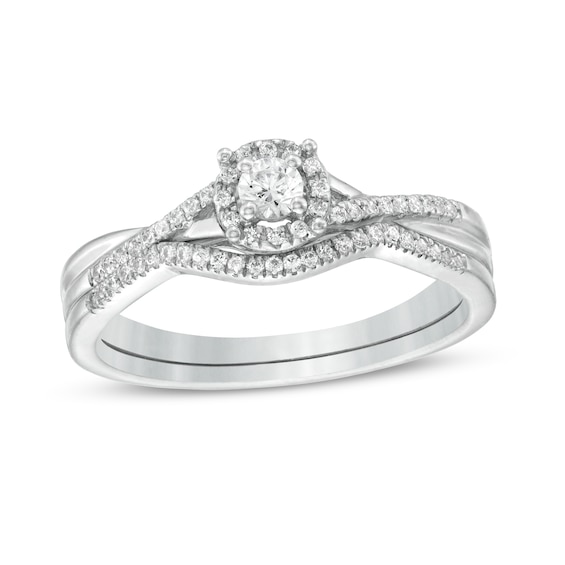 1/4 CT. T.w. Diamond Frame Twist Shank Bridal Set in Sterling Silver
