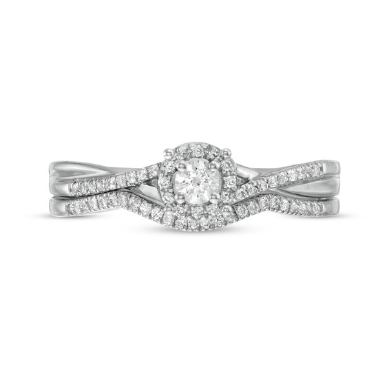 1/4 CT. T.w. Diamond Frame Twist Shank Bridal Set in Sterling Silver