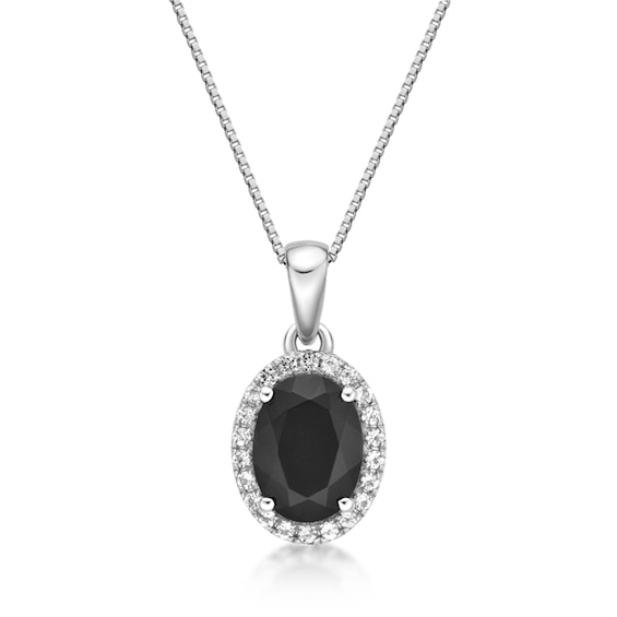 Oval Onyx and White Topaz Frame Pendant in Sterling Silver