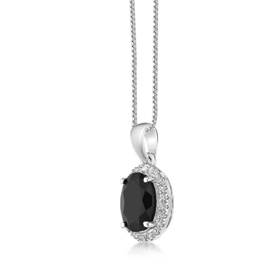 Oval Onyx and White Topaz Frame Pendant in Sterling Silver