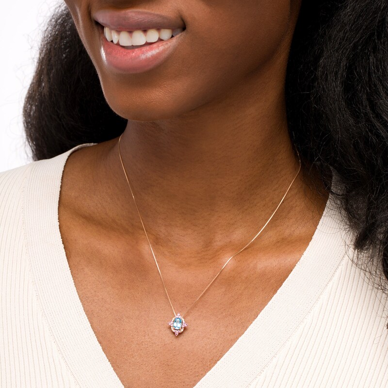 Captivating Color Swiss Blue Topaz, Pink Spinel and 1/20 CT. T.W. Diamond Frame Pendant in 14K Rose Gold