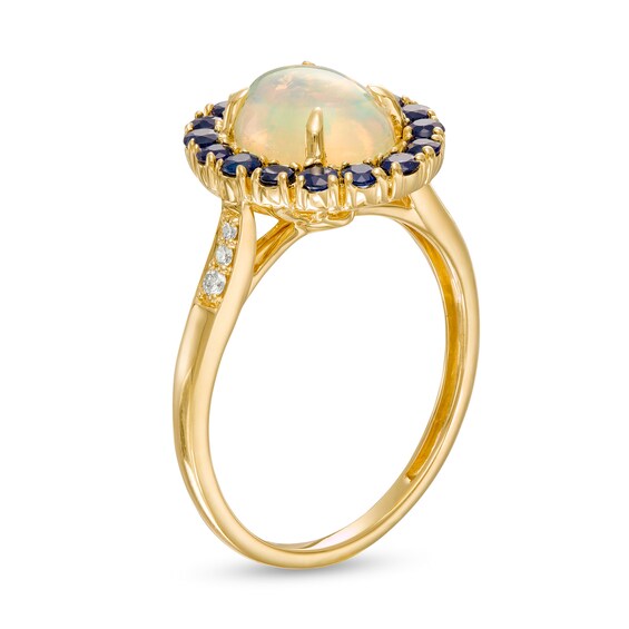 Captivating Color Oval Opal, Round Blue Sapphire and 1/20 CT. T.w. Diamond Frame Ring in 14K Gold