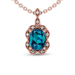 Elongated Cushion-Cut London Blue and White Topaz Rope Frame Pendant in 10K Rose Gold