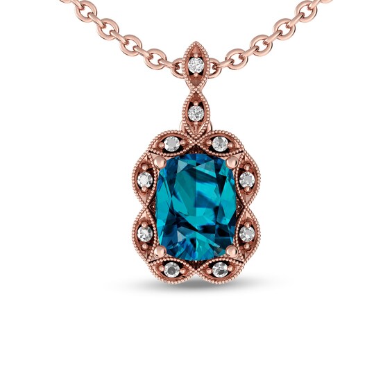 Elongated Cushion-Cut London Blue and White Topaz Rope Frame Pendant in 10K Rose Gold