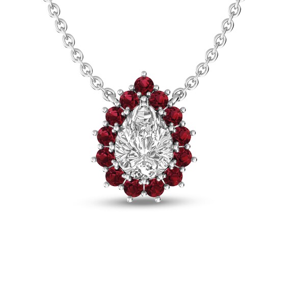 Pear-Shaped White Topaz and Garnet Sunburst Frame Pendant in Sterling Silver