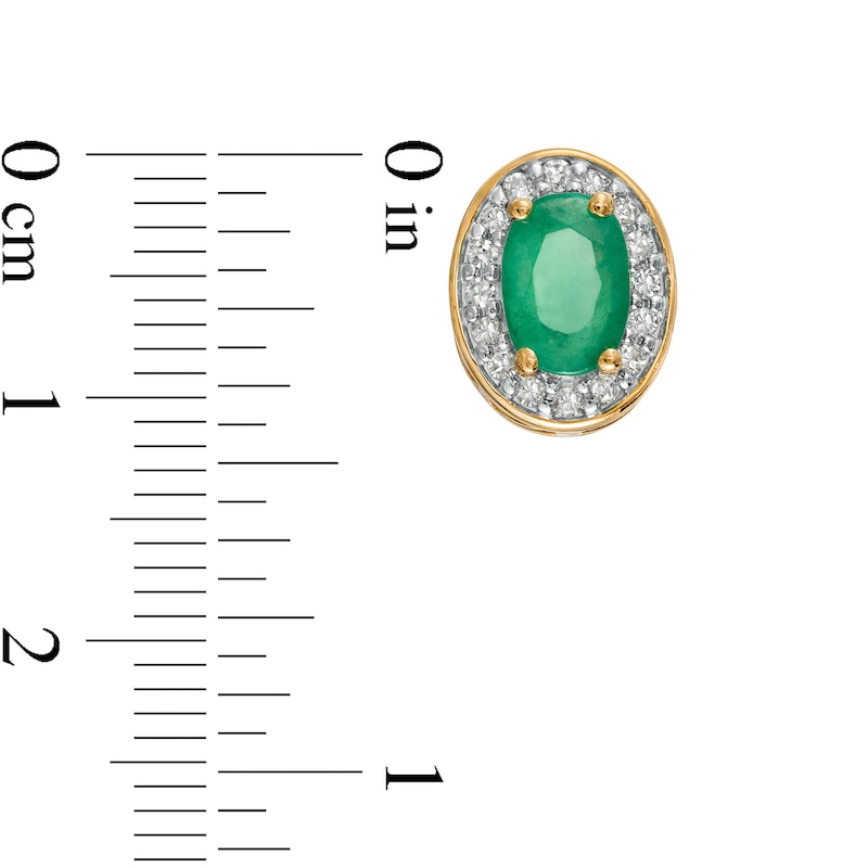 Main Image 3 of Oval Emerald and 1/8 CT. T.W. Diamond Frame Ornate Stud Earrings in 10K Gold