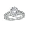 Thumbnail Image 1 of Zales Private Collection 1-1/4 CT. T.W. Certified Colourless Oval Diamond Split Shank Engagement Ring in 14K White Gold