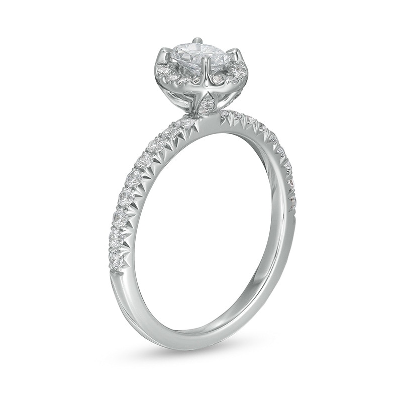 1 CT. T.W. Oval Diamond Frame Engagement Ring in 14K White Gold (I/I2)