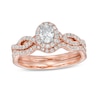 Thumbnail Image 0 of 1 CT. T.W. Oval Diamond Frame Split Shank Bridal Set in 14K Rose Gold (I/I2)