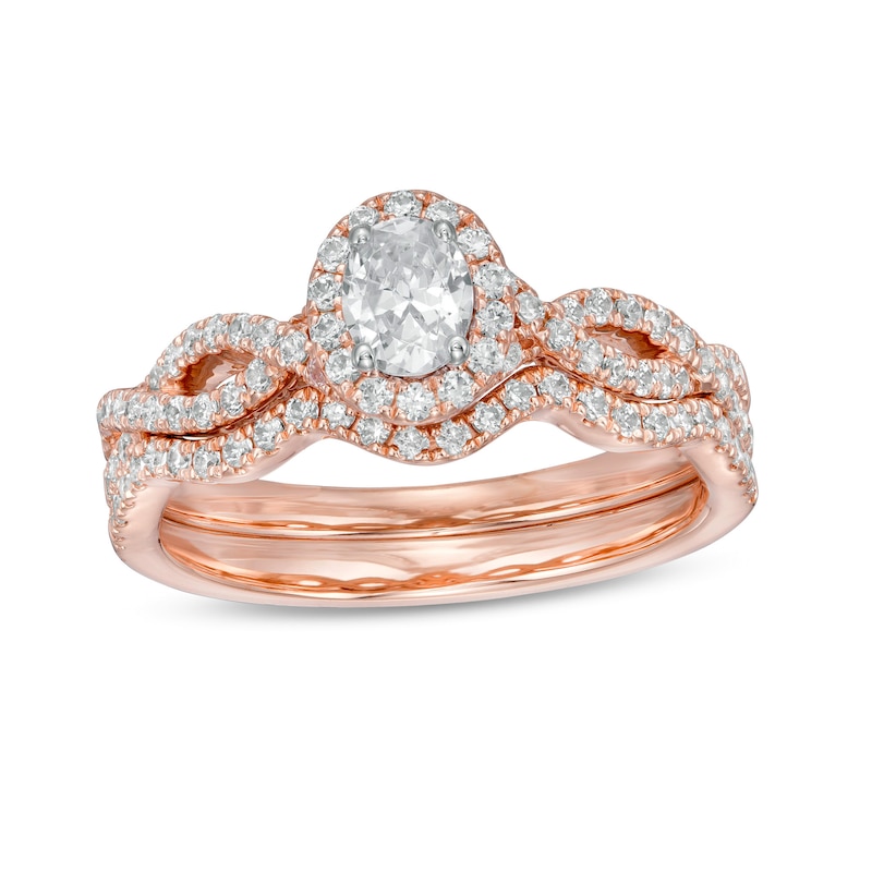 1 CT. T.W. Oval Diamond Frame Split Shank Bridal Set in 14K Rose Gold (I/I2)