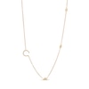 Thumbnail Image 1 of 1/8 CT. T.W. Diamond Crescent Moon Station Necklace in 10K Gold