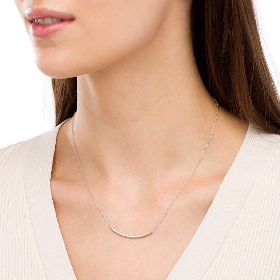 1/6 CT. T.w. Baguette and Round Diamond Curved Bar Necklace in 10K White Gold
