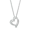Thumbnail Image 1 of 1/8 CT. T.W.  Diamond Tilted Double Row Heart Pendant in Sterling Silver